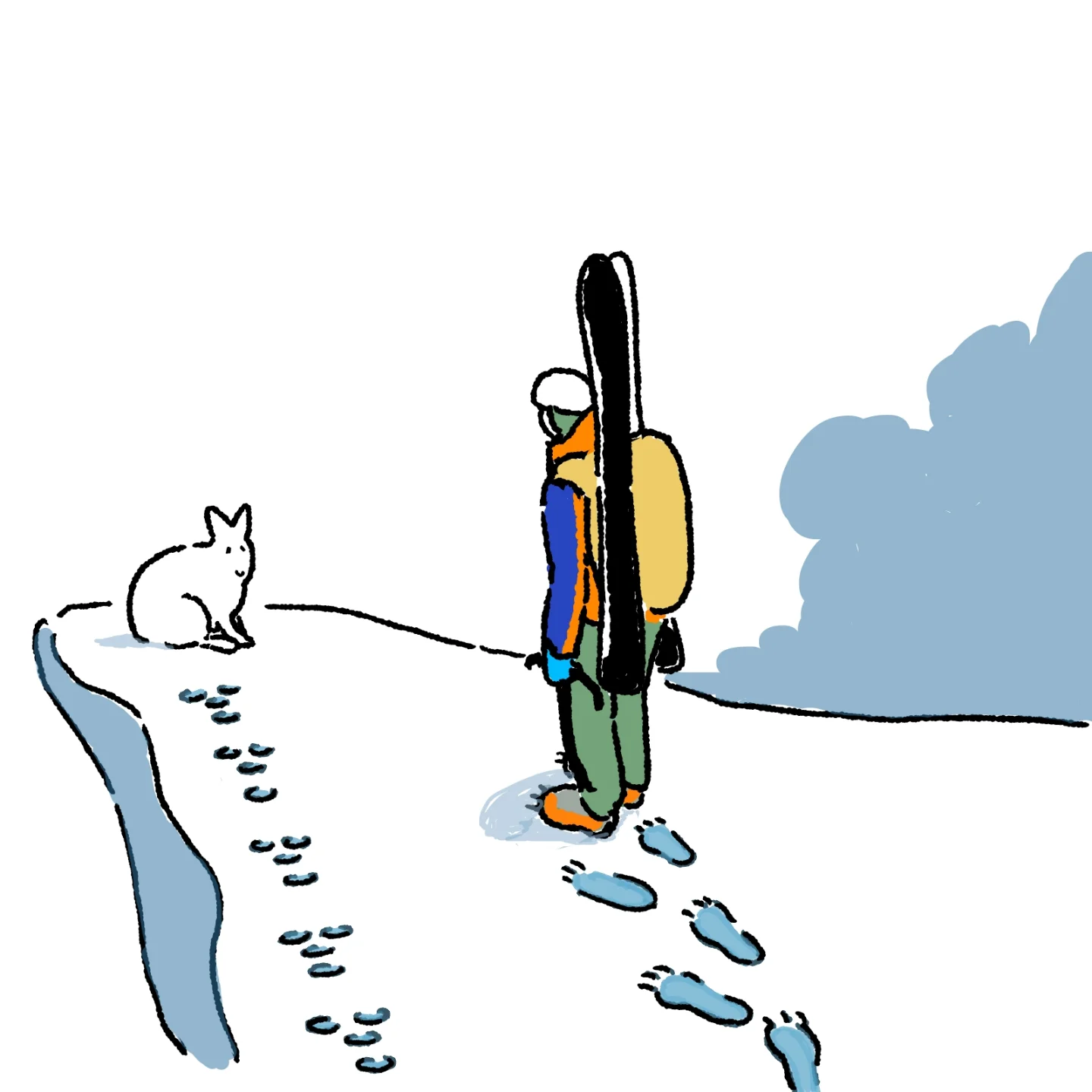 雪の上を歩く人とキツネの足あと